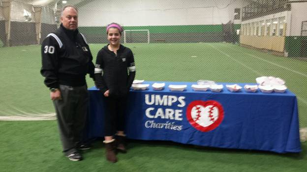 From left – Eric Olsen, clinic co-chair and Emma Augostini, youth volunteer auction assistant.